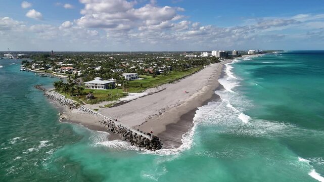 Beachfront homes along the north side of Jupiter Inlet in the town of Jupiter in Palm Beach County, Florida. 