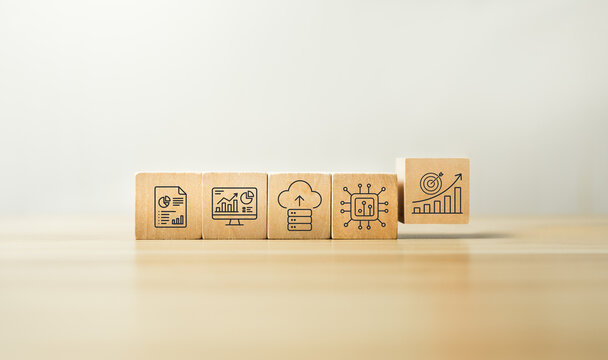 Digital transformation growth concept with wooden blocks showing report dashboard cloud computing artificial intelligence chip and target chart icons for business technology strategy