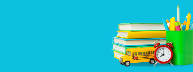 School supplies set with a clock and bus for students © Atlas