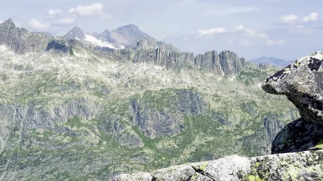 Jagged granite ridge and snow-streaked alpine peaks above the Grimsel