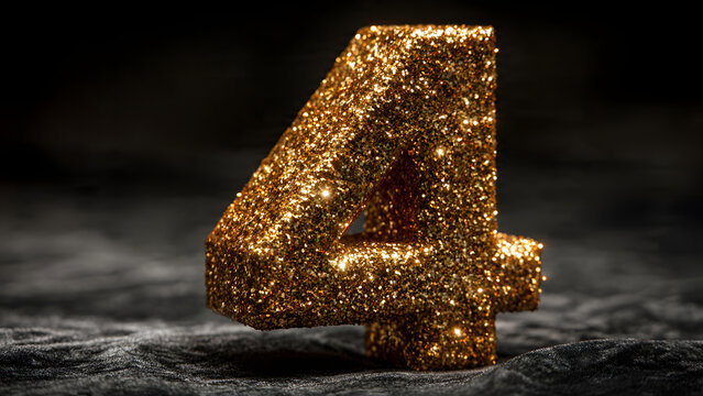 Golden glitter number four on dark textured background