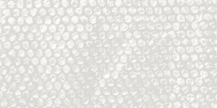 abstract texture background featuring the repeating circular patterns of plastic bubble wrap.