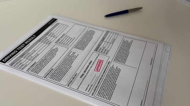 Driving Test Application Form Marked Approved With Green Stamp