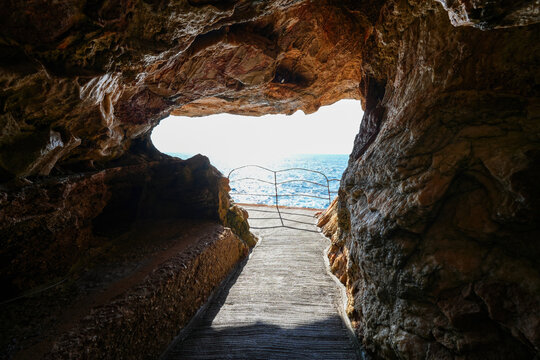 View from inside the entrance of Neptune's Grotto at Capo Caccia in Sardinia, Italy