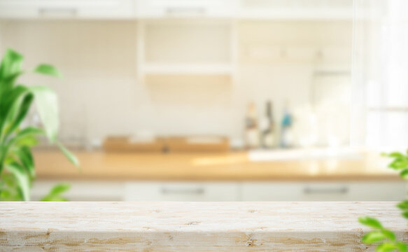 Product display shot.White vintage rustic wood table top with cozy kitchen interior background in morning