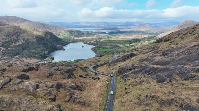 Ireland Epic Locations cars climbing up the Kerry Side of The Healey Pass stunning mountain scenery Ireland