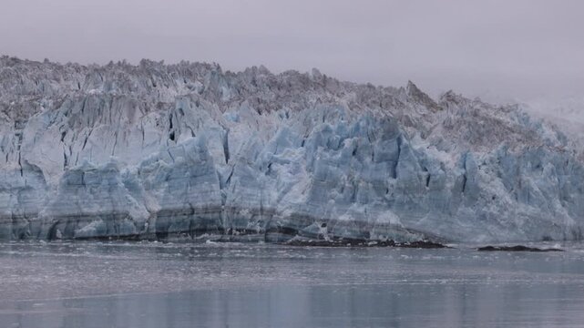 a close zoom in clip of a section of the terminus face of hubbard glacier in alaska of the usa