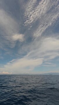 Ocean Horizon with Wispy Clouds