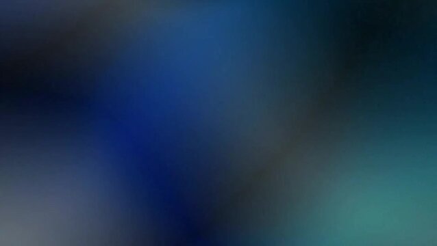 A soft, abstract gradient background featuring shades of deep blue, dark teal, and subtle hints of black, creating a smooth, blurred visual effect.