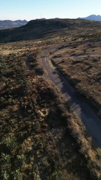 Aerial vertical view of open semi desert scrubland crossed by dirt tracks in the dry highlands of central Mexico near Aguascalientes.