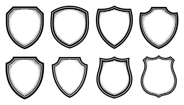 Blank shield crest shapes and heraldic emblems set in vintage engraving style