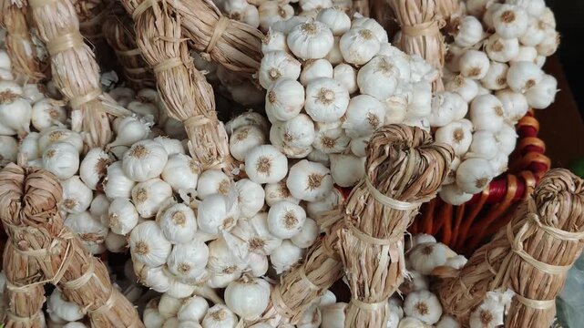 A pile of garlic in a basket.