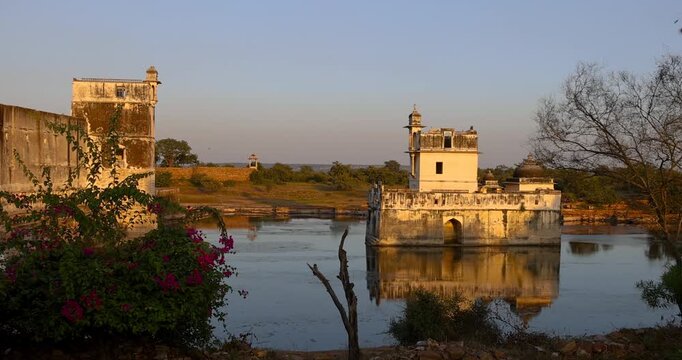 Panning shot of Padmini Palace in Chittorgarh Fort at sunset