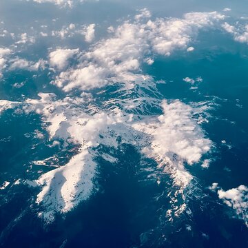 Snowy Mountain Peaks from Aerial View