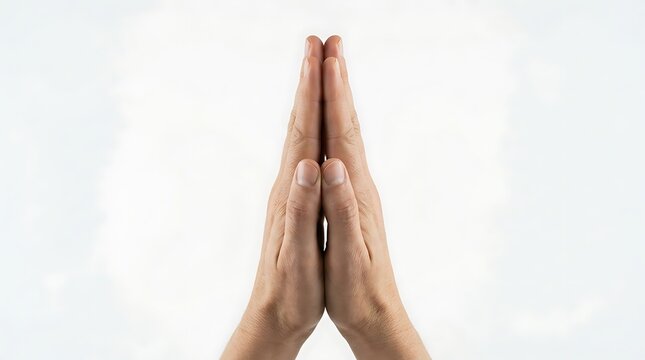 Praying hands together in a gesture of gratitude isolated on white background