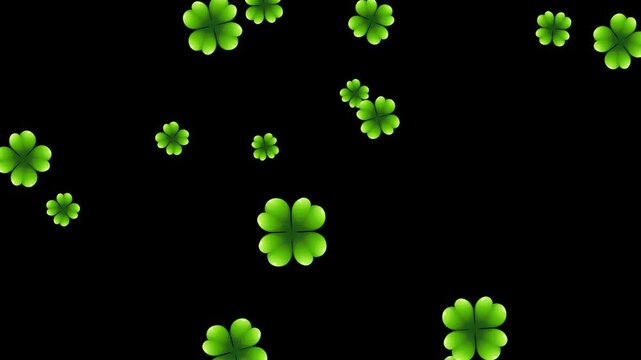 Green Four Leaf Clovers Falling Against a Solid Black Background