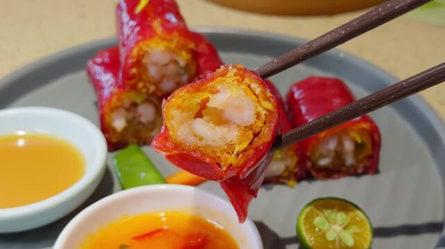 Cantonese Red Rice Noodle Roll Cheung Fun Lifted by Chopsticks Close-Up