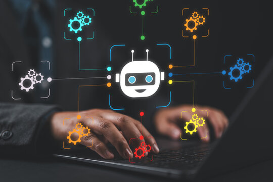 AI driven robotic process automation AIRPA. Artificial intelligence agent and intelligent automation IA technology. Businessman using laptop computer to give instructions to AI at desk in office.