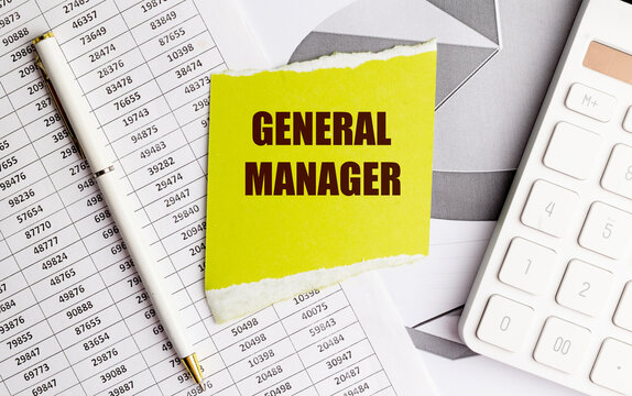 General manager text on torn paper with calculator financial documents and pen representing business leadership executive management