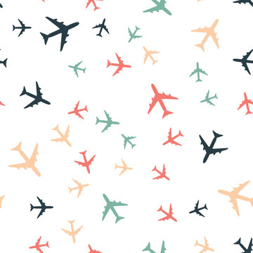 Seamless pattern of colorful airplanes on a white background aviation travel design
