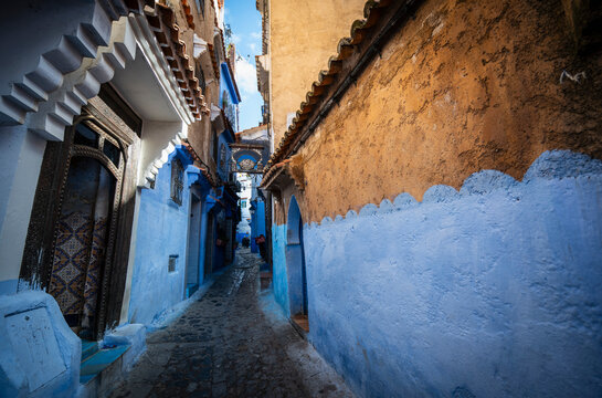 Narrow blue painted street in Chefchaouen Morocco