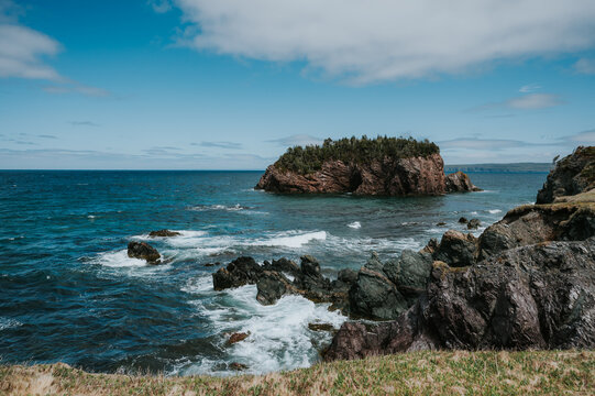 Rugged Newfoundland coastline with a small island