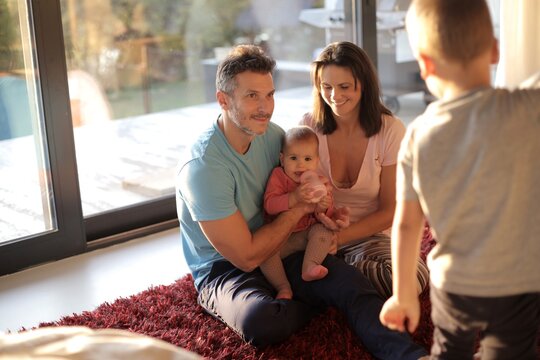 Young family enjoying a quiet afternoon at home