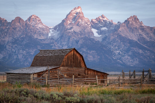 Historic Wooden Barn in Front of the Grand Teton Mountain Range