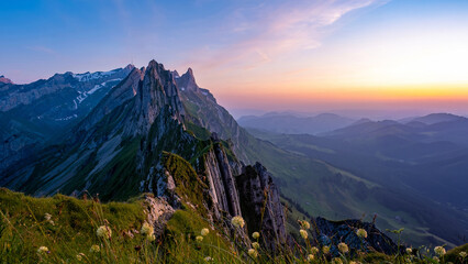 Obraz premium Sunset in the mountains, Schaefler Altenalptuerme mountain ridge, Swiss Appenzell Innerrhoden, Switzerland, a steep ridge of the majestic Schaefler peak in the Alpstein mountain