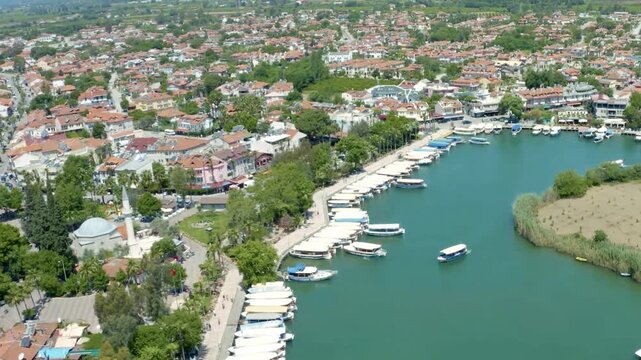 Scenic Riverside Town of Dalyan Turkey with Boats Mountains and Traditional Architecture