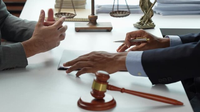 Lawyer consulting with a client about a legal contract