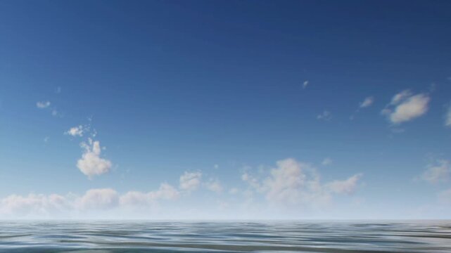 A wide view shows a clear blue sky with some clouds above a calm ocean. The sunlight reflects off the water surface and creates a bright atmosphere.