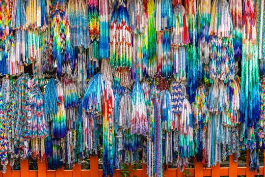 Colorful origami senbazuru paper cranes hanging in japan