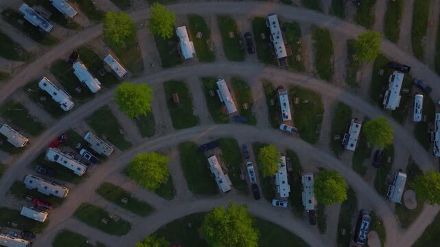 From straight above, an RV park reads like a diagram &mdash; spokes, commons, pool, and play space &mdash; a metaphor for how design turns strangers parking overnight into a functioning village. Wisconsin