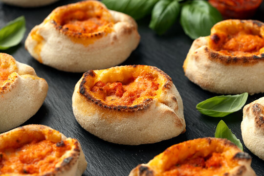 Italian Salami Pizza Bites on stone board