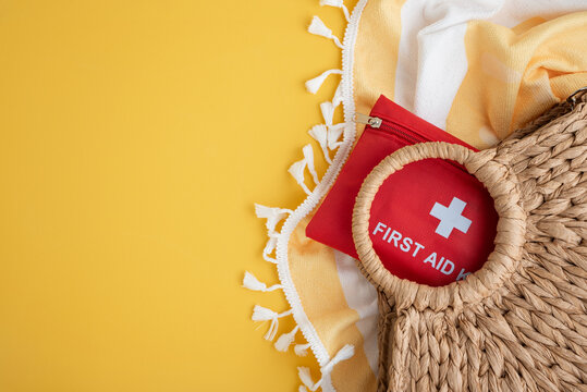 First aid kit in beach bag for summer safety