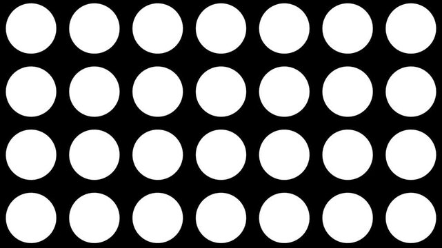 Geometric grid wipe transition animation loop featuring scaling white circles popping up to fill the screen, transitioning from a solid black screen to a solid white screen and reversing back to black