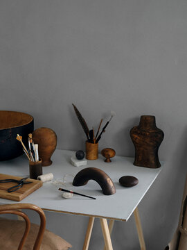 Handmade wooden organic products placed in a artful way. Art deco interior magazine