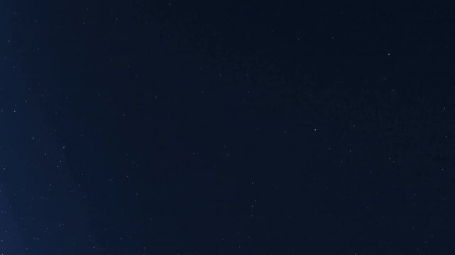 Initial blue band appearing, curved planetary limb brightening and drifting across starfield