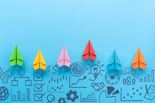 Paper planes and business strategy on blue background, Business competition, success, innovation and solution concept