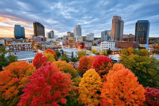 Autumn Cityscape With Vibrant Fall Foliage And Modern Skyline At Sunset, Urban Nature Transition