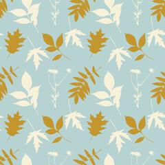 Fototapeta premium Seamless pattern with autumn oak, maple, and rowan leaves in mustard yellow and cream white colors on a light blue background for seasonal home decor, textile, and gift wrap design.