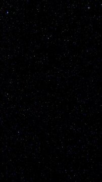 Rotating Deep Space Star Field. Countless stars turn smoothly counterclockwise across a dark cosmic background.