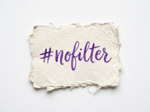 Handwritten hashtag NofILter on rough textured paper, authenticity Concept social media trend, showing real and unedited content.