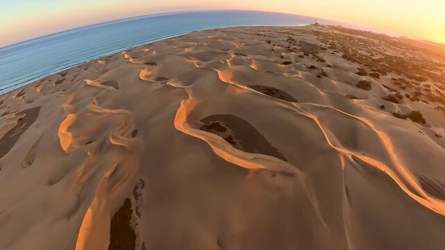 Aerial view of the sunset over dunes in Gran Canaria