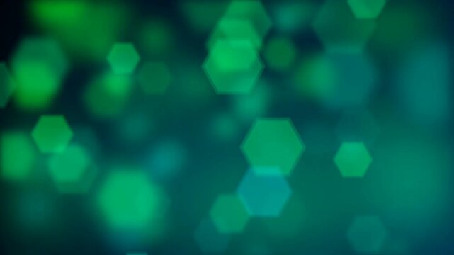 Video motion background bokeh dominated by calming shades of green and teal. 