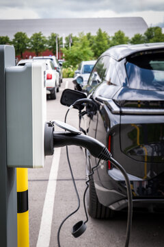 Electric Vehicle Charging at a Public Station in an Urban Parking Area