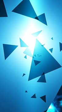 Blue abstract background with flying geometric shards