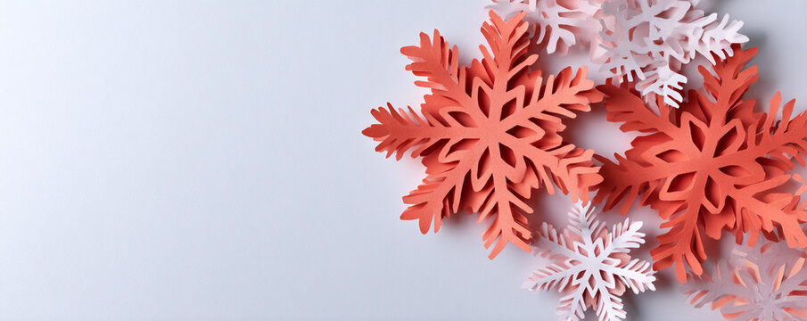Minimal snowflake paper layers framing holiday title isolated on plain background