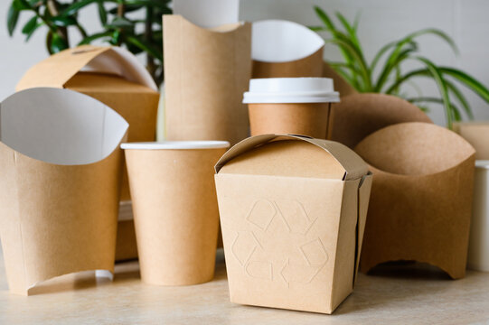 Embossed recycling sign. Eco-friendly tableware and food packaging.